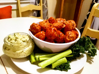 A platter with Buffalo Meatballs with Avocado Dipping Sauce.