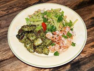 A plate of Tequila Lime Shrimp with Cilantro Pesto Grilled Red Potatoes